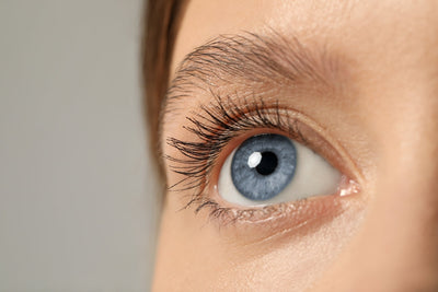 Close-up of a person's eye at a post-operative check after laser refractive surgery